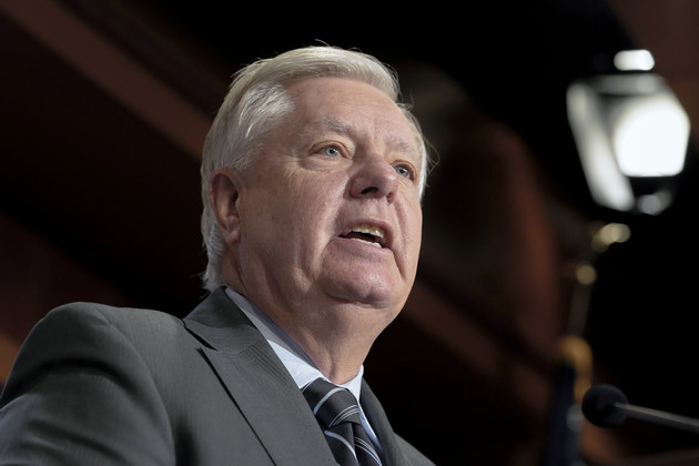 Sen. Lindsey Graham talks during a news conference on immigration at the Capitol in Washington.