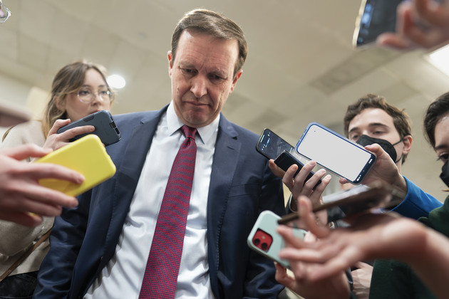 Sen. Chris Murphy speaks with reporters at the Capitol in Washington.