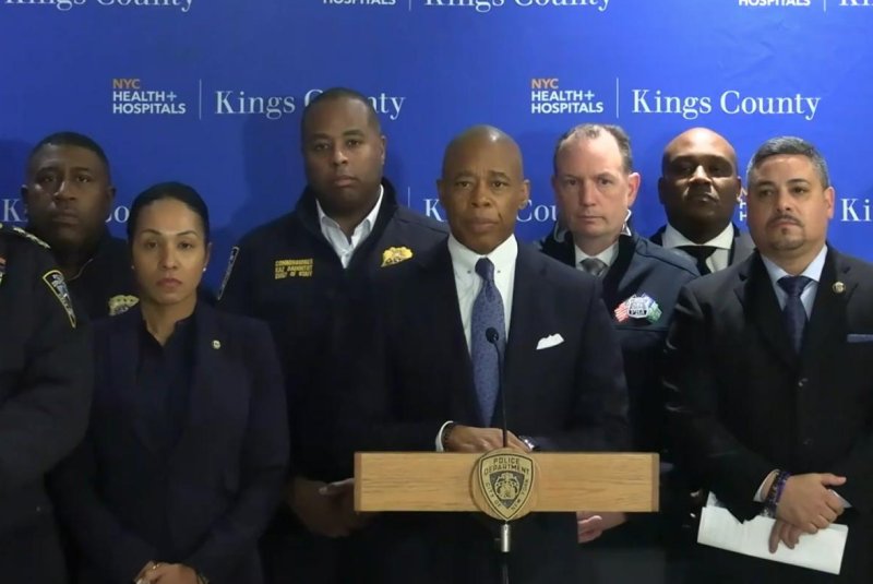 “We had a very violent and dangerous person that has a long record of violence attempted to harm our police officers, but they responded accordingly,” New York City Mayor Eric Adams (C) told reporters Tuesday during a press briefing at NYC Health + Hospitals/Kings County, where the two injured officers are being treated. Photo courtesy of NYPD