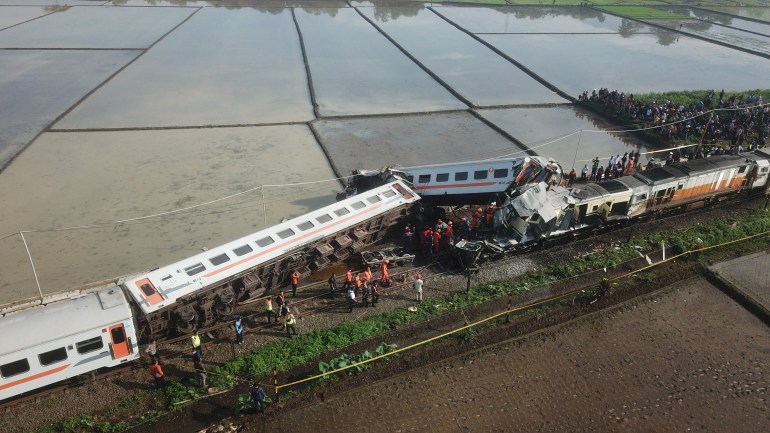 An aerial view shows the aftermath of a collision between the Bandung Raya local train and the Turangga train in Cicalengka, Bandung, West Java province, Indonesia, January 5, 2024, in this photo taken by Antara Foto. Antara Foto/Raisan Al Farisi/via REUTERS ATTENTION EDITORS - THIS IMAGE HAS BEEN SUPPLIED BY A THIRD PARTY. MANDATORY CREDIT. INDONESIA OUT. NO COMMERCIAL OR EDITORIAL SALES IN INDONESIA.