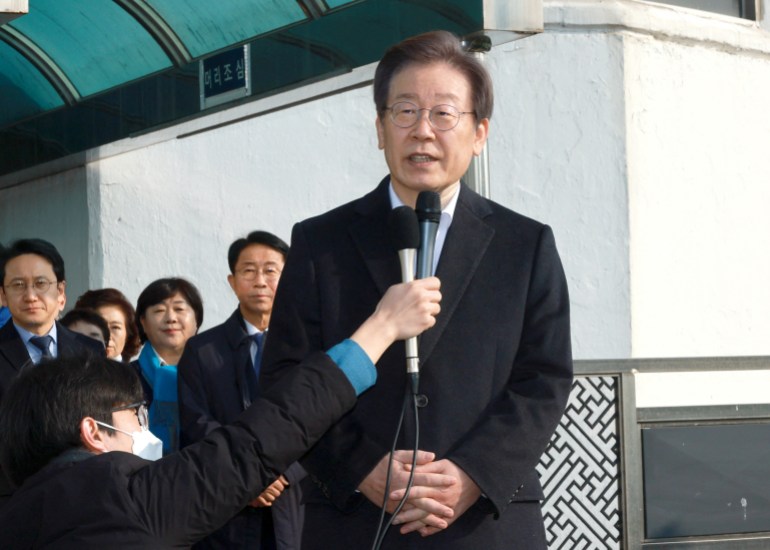 South Korea's opposition Democratic Party leader Lee Jae-myung speaks after being discharged at Seoul National University Hospital in Seoul, South Korea