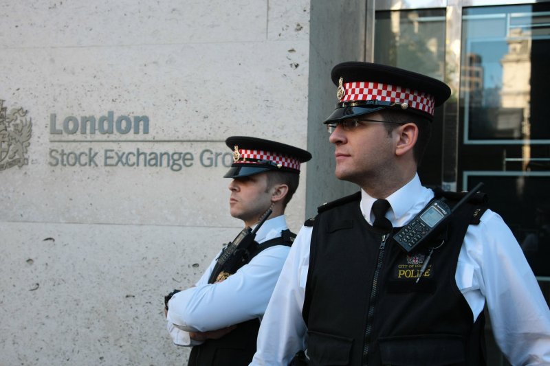 Metropolitan Police officers guard the London Stock Exchange during a protest in 2011. Palestine Action claimed Monday that journalist Max Parry “infiltrated” the organization under an assumed identity before leaking information to London Metropolitan Police. Photo by Hugo Philpott/UPI