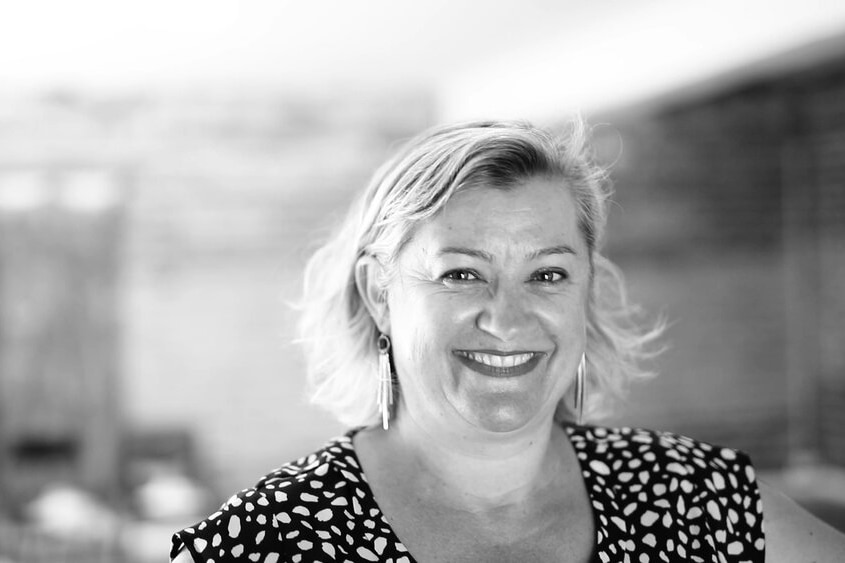 Woman's headshot in black and white photo