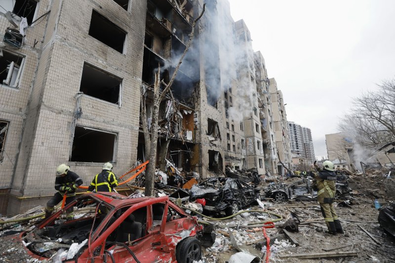 Rescuers at work at the site of a missile strike in Kyiv, Ukraine, January 2, 2024, after a third night of Russian attacks in retaliation for a Ukrainian attack on the Russian city of Bolgorod on Saturday. Service said. Photo by Sergey Dolzhenko/EPA-EFE