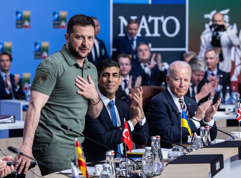 Ukrainian President Volodymyr Zelensky (L), British Prime Minister Rishi Sunak (C), and U.S. President Joe Biden (R), attend the second day of the NATO Summit meeting on July 12, 2023, in Vilnius, Lithuania. Britain on Monday announced that it will be deploying 20,000 troops to participate in Nato's Exercise Steadfast Defender during the first half of the year. Photo by NATO/UPI