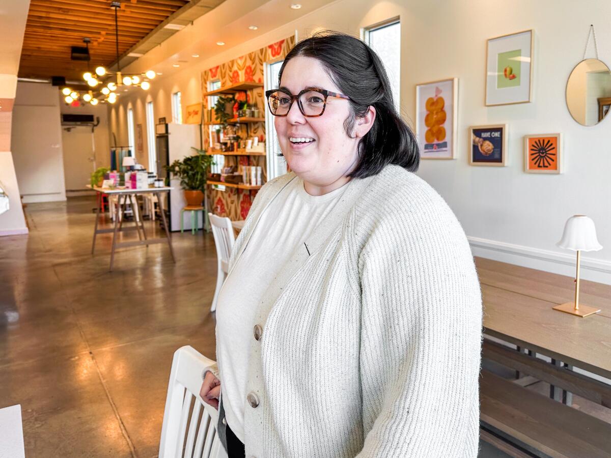 Nicole Rucker stands in the dining room of her new Fat & Flour location in Culver City.