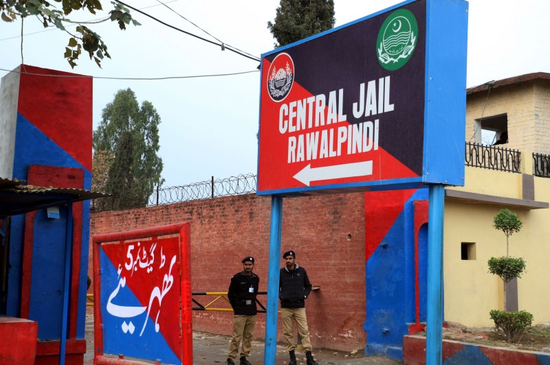 Pakistani police stand guard at Adiala Jail in Rawalpindi on Wednesday after a special court convened inside the prison sentenced former prime minister Imran Khan and wife Bushra Bibi to 14-year jail terms for corruption. Photo by Sohail Shahzad/EPA-EFE