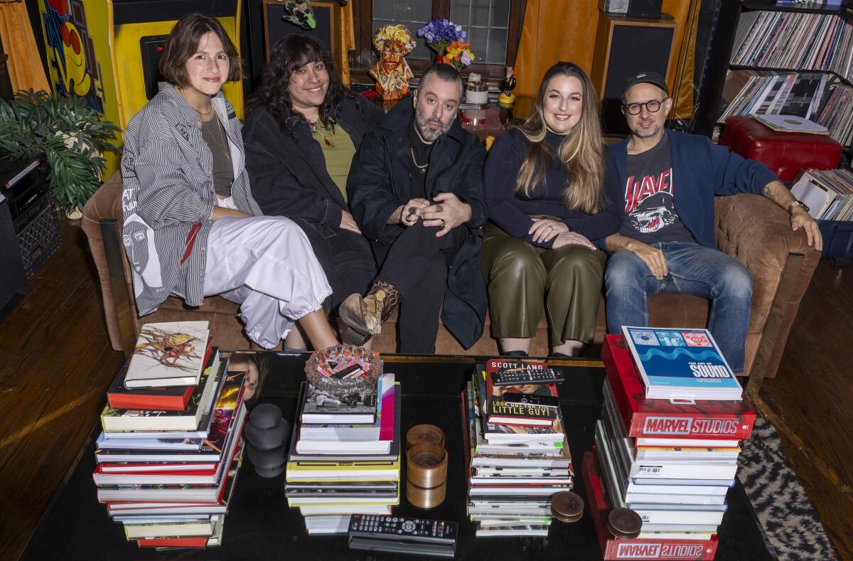 Group of people sitting on a couch