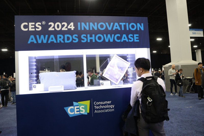 A CES 2024 attendee views products on display before the start of the 2024 International CES, at the Mandalay Bay Convention Center in Las Vegas, Nevada on Sunday. Photo by James Atoa/UPI