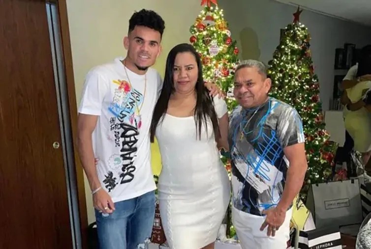 Luis with his mum and dad Luis Manuel