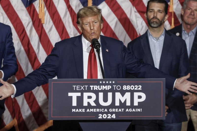 Former President Donald Trump celebrates his win Monday in the 2024 Iowa Caucus in Des Moines. On Wednesday, a judge in Maine declined to rule on whether to uphold or overturn a decision to remove Trump from Maine's 2024 primary ballot, pending a decision on a similar case before the U.S. Supreme Court. Photo by Tannen Maury/UPI