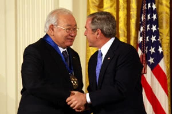 Native American poet, author and visual artist M. Scott Momaday (L) accepts the National Medal of Arts from President George W. Bush in 2007. File Photo by Michael Stewart/Wikimedia Commons