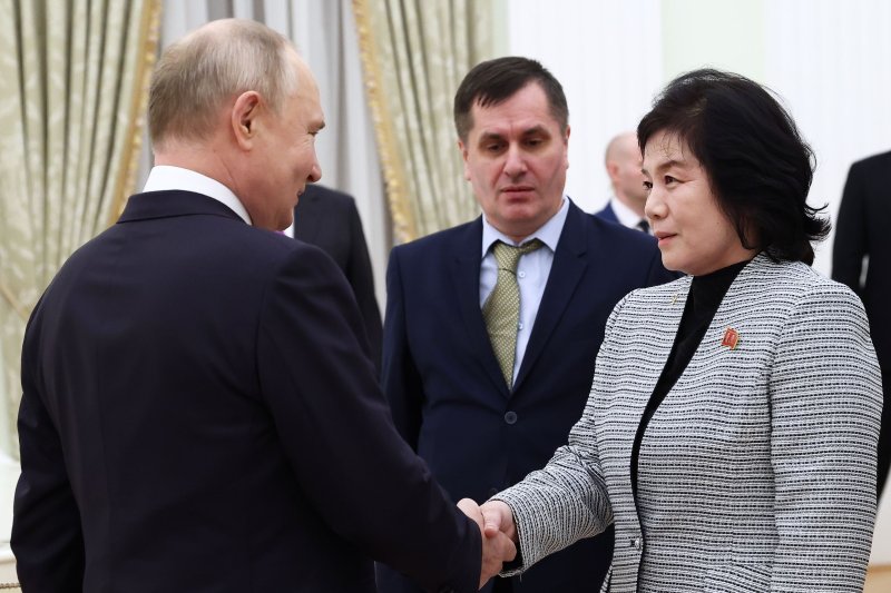 Russian President Vladimir Putin (L) welcomes North Korean Foreign Minister Choe Son Hui (R) during their meeting in the Kremlin on Tuesday. Kremlin Pool Photo by Artem Geodakyan/Sputnik/EPA-EFE