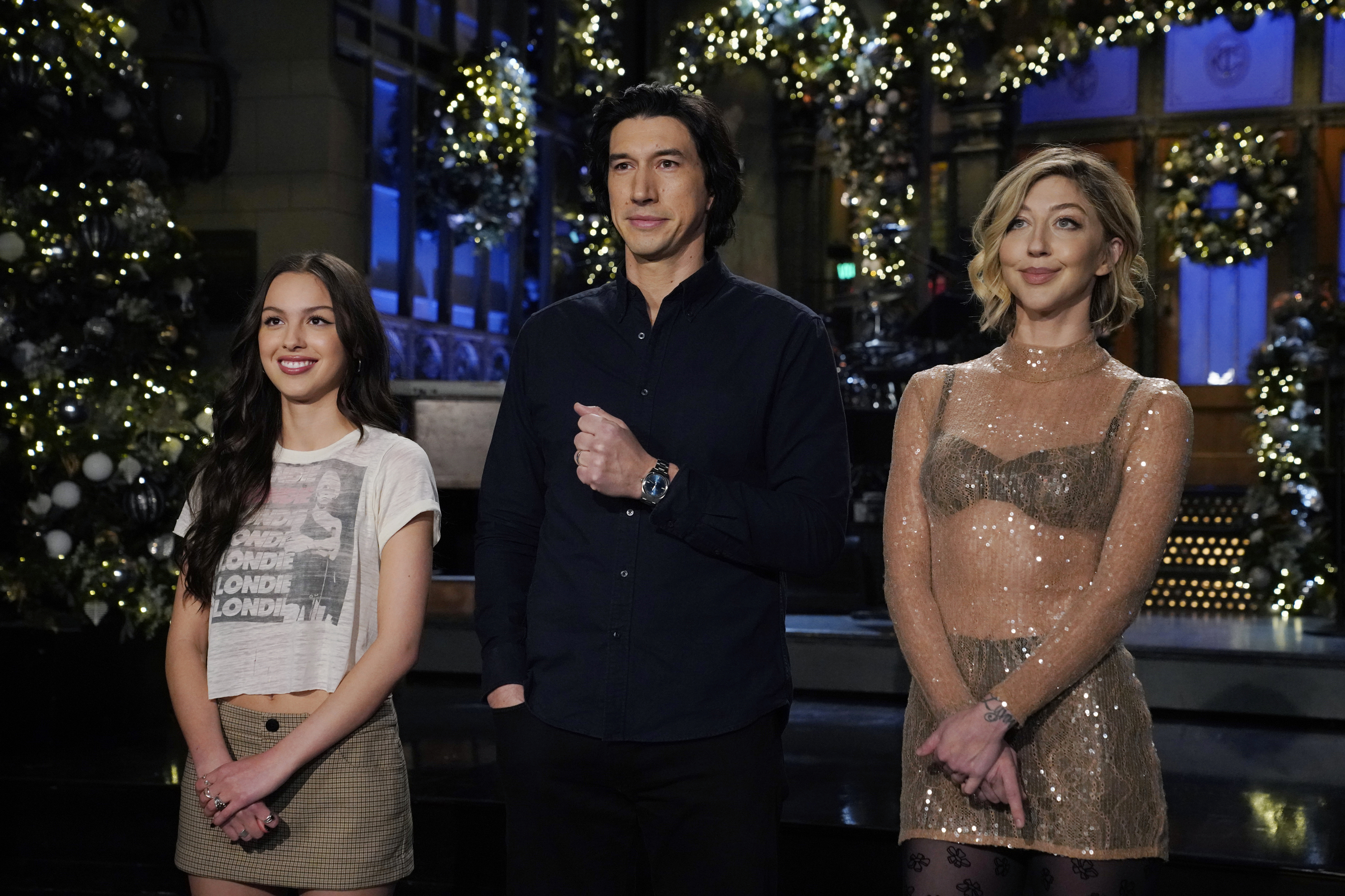 Musical guest Olivia Rodrigo, host Adam Driver, and SNL cast member Heidi Gardner pictured during promo filming in Studio 8H on Thursday, December 7, 2023