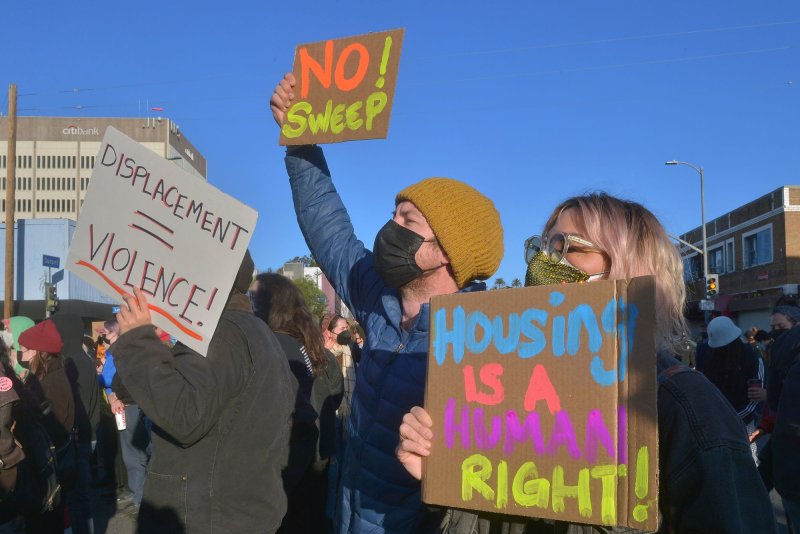 A group of activists and homeless residents gather on Sunset Boulevard in Los Angeles to protest against plans by the city to clear a large homeless encampment on March 24, 2021. File photo by Jim Ruymen/UPI