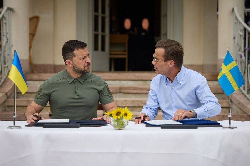 Swedish Prime Minister Ulf Kristersson (R) meets with Ukrainian President Volodymyr Zelensky in Stockholm on August 19. "A key milestone has been reached," Kristersson wrote on X, as Turkish President Tayyip Erdogan signed legislation giving its permission for Sweden to join NATO. Photo by Ukrainian President Press Office/ UPI