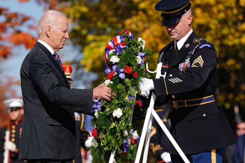 President Joe Biden lays a wreath at the Tomb of the Unknown Soldier in Nov. 2023 at Arlington National Cemetery. On Sunday, Biden said the U.S. will respond to the deaths of the three Georgia soldiers killed in Jordan. File Photo by Bonnie Cash/UPI