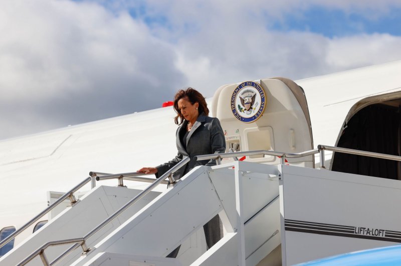 Vice President Kamala Harris walks off Air Force Two at Milwaukee International Airport in September. On Tuesday, her plane, en route from Atlanta, Ga., to Joint Base Andrews in Maryland, was diverted to Washington Dulles International Airport because of bad weather. File Photo by Jeffrey Phelps/UPI