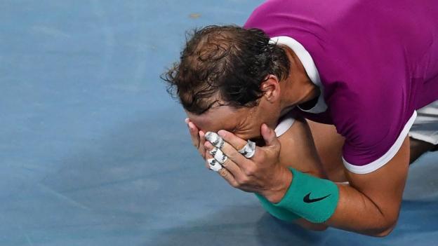 Rafael Nadal falls to the floor in disbelief