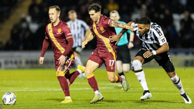 Motherwell and St Mirren players in action