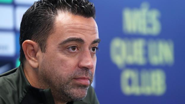 Xavi at a Barcelona media conference