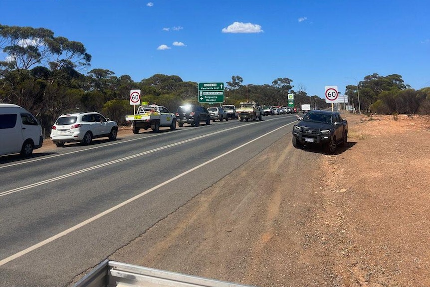 Cars queue for fuel 