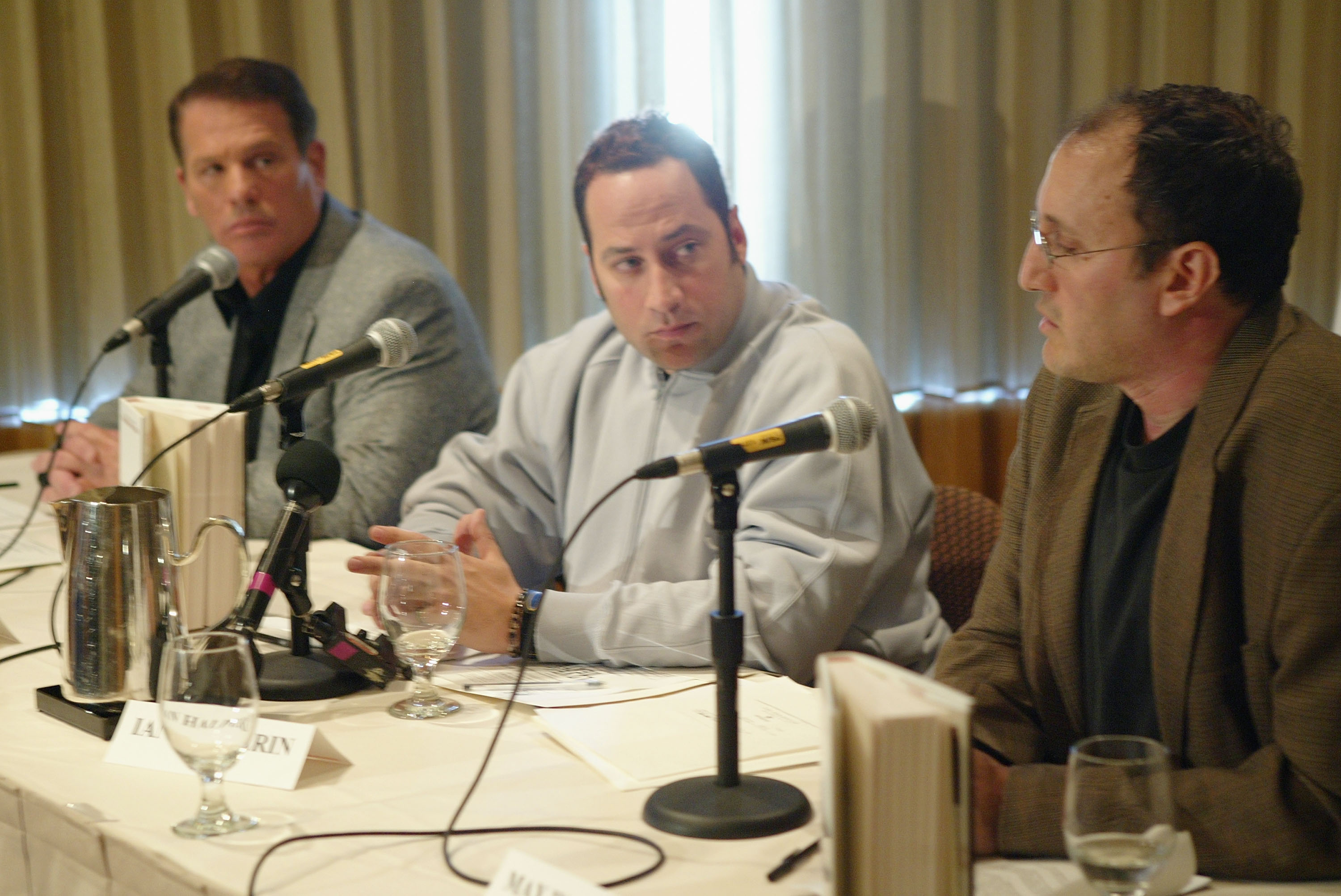 Private investigator Tom Grant (left) with authors Ian Halperin (middle) and Max Wallace (right) at a press conference in April 2004