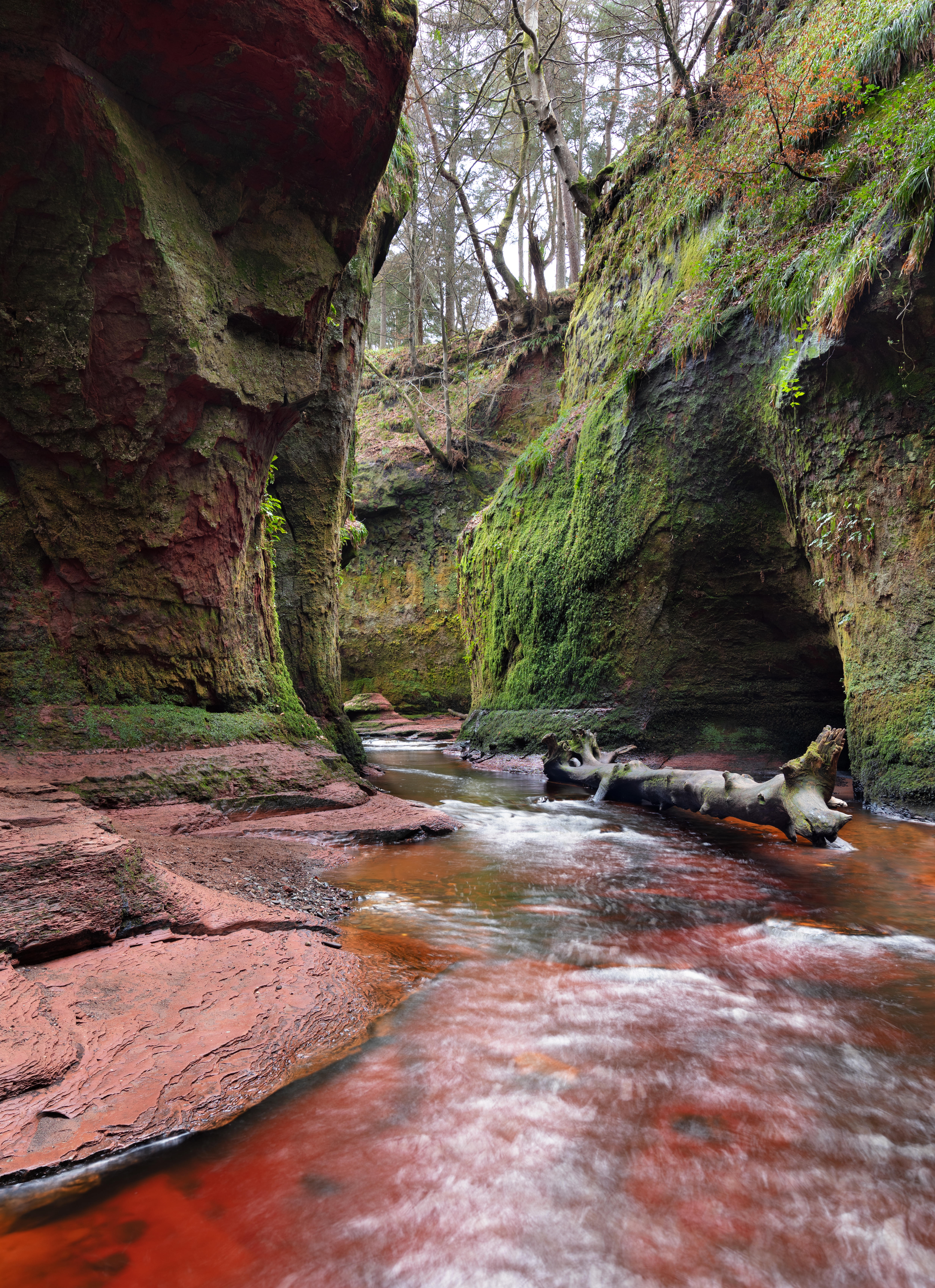 The pigment from the river's sandstone bed gives the water its red hue