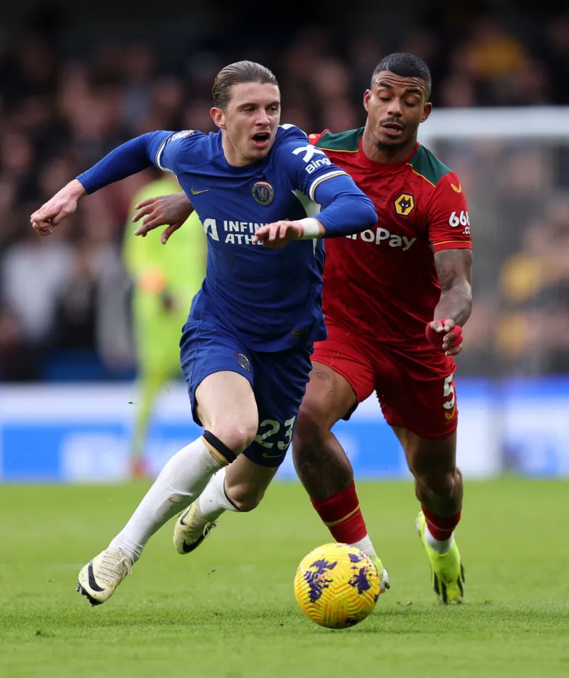 Chelsea midfielder Conor Gallagher tries to evade Mario Lemina