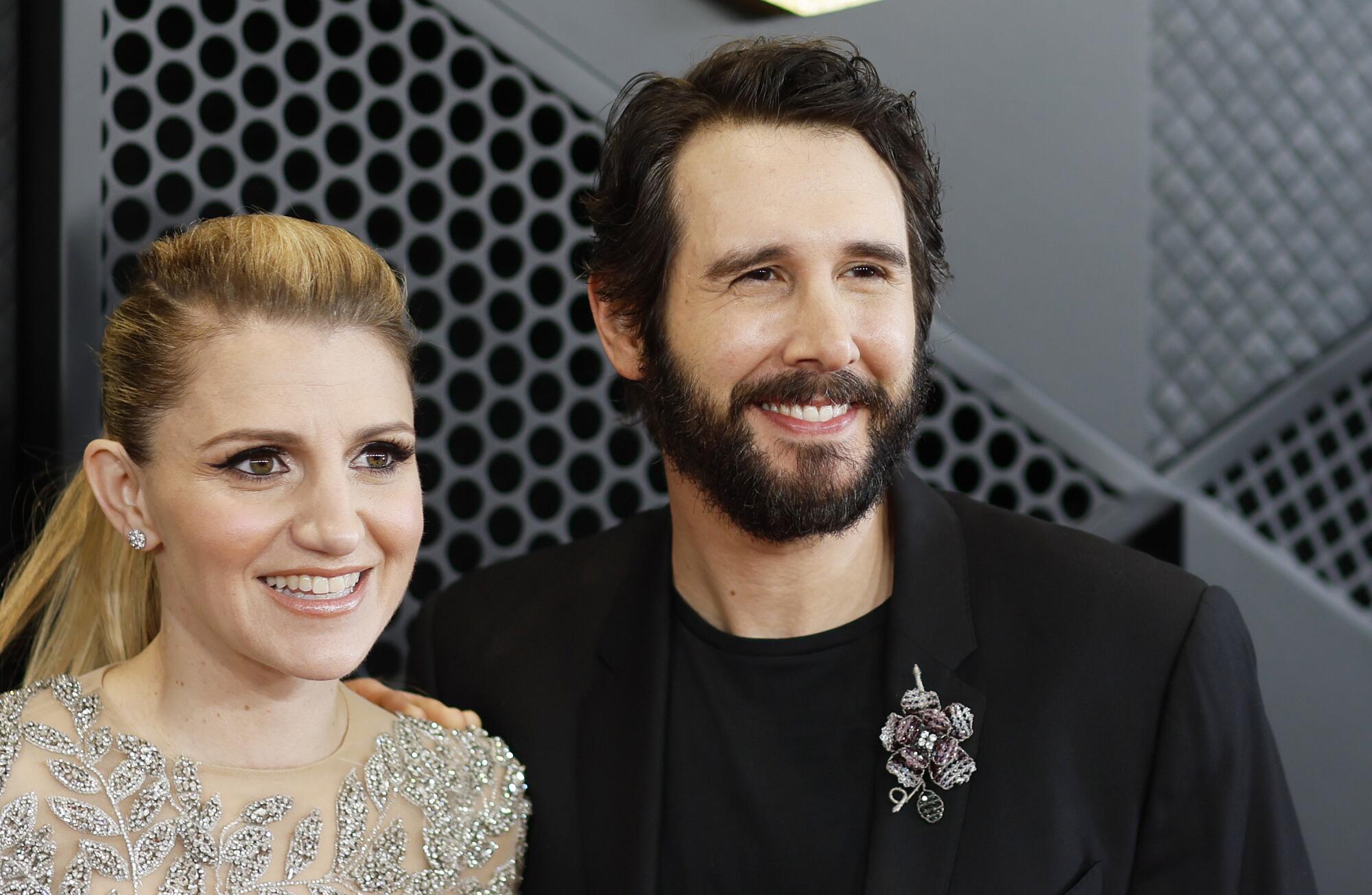 Annaleigh Ashford and Josh Groban arrive on the Grammys red carpet. 