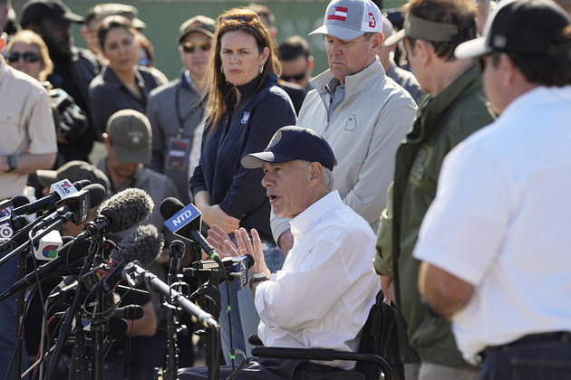 Greg Abbott (center) is joined by fellow governors during a press conference in Eagle Pass, Texas.