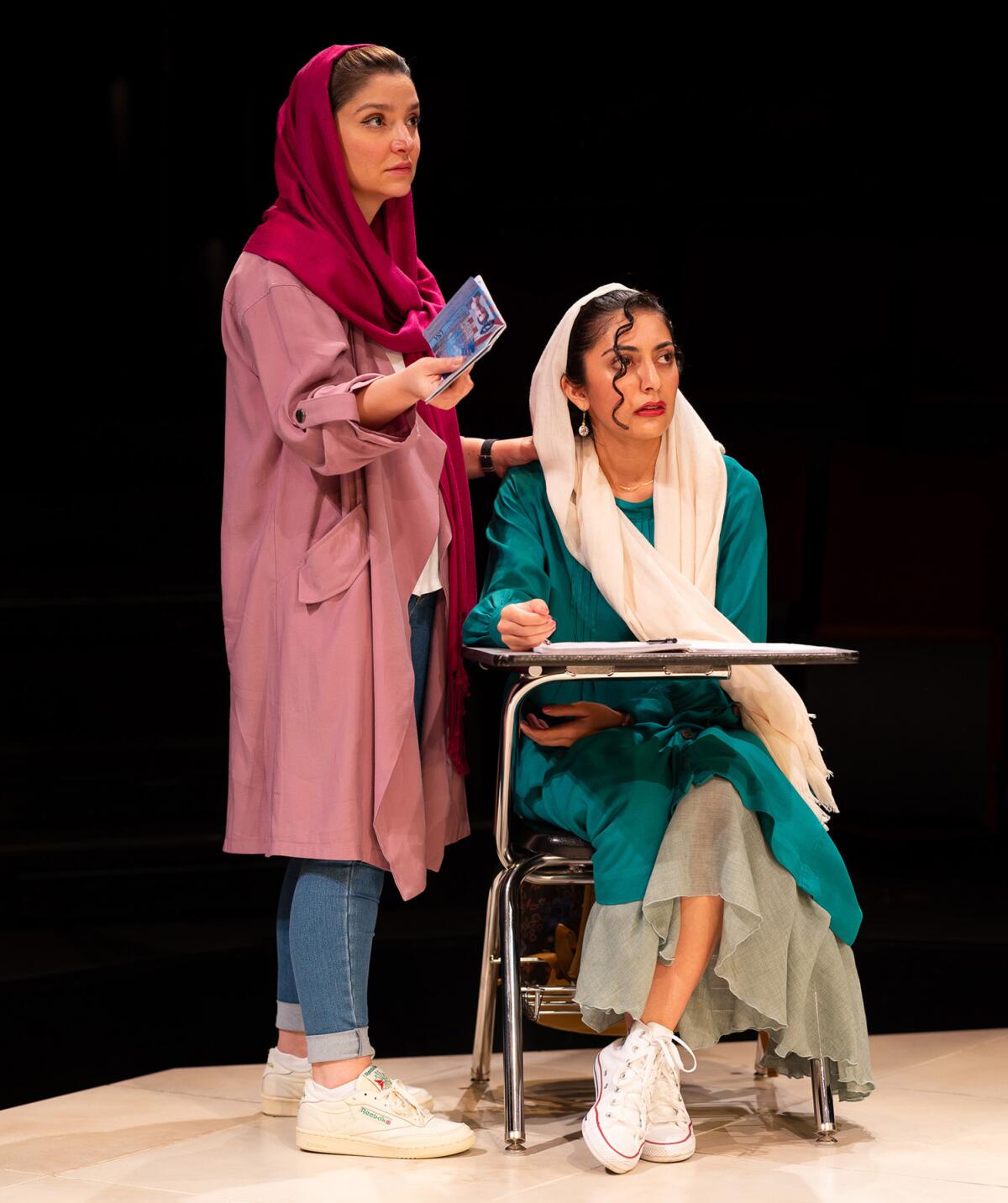 Tara Grammy, left, and Ari Derambakhsh in the Old Globe's production of "English."