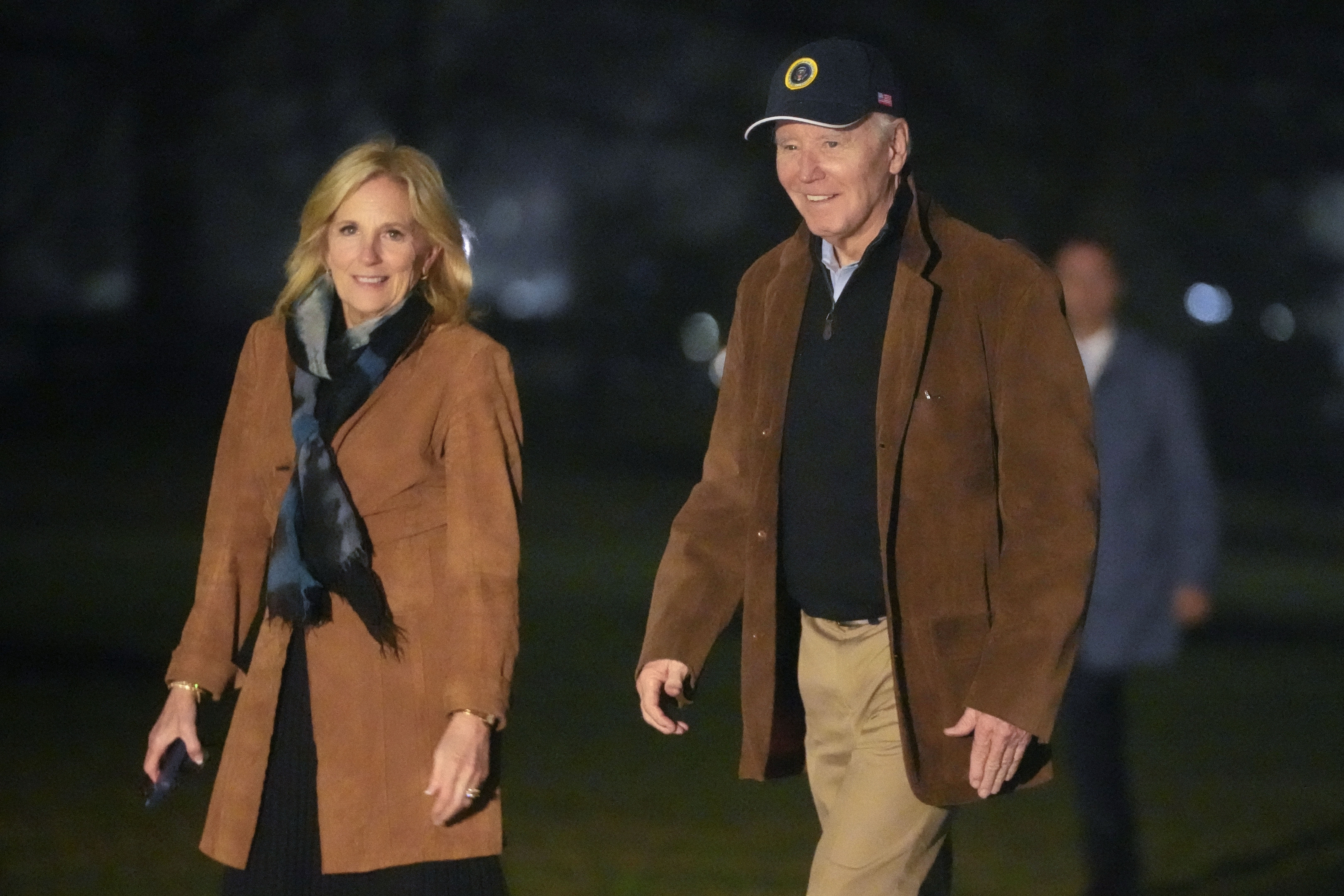 President Biden and Jill Biden were pictured walking across the White House lawn Sunday night