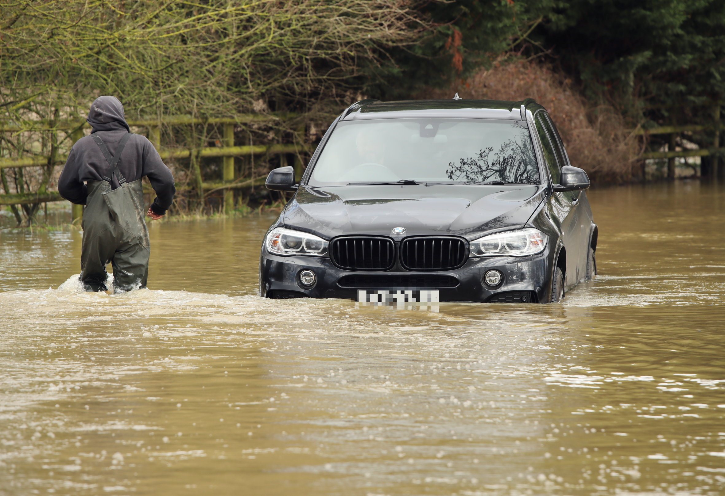 A BMW X3 was left stranded when it got stuck in floodwater near Chelmsford