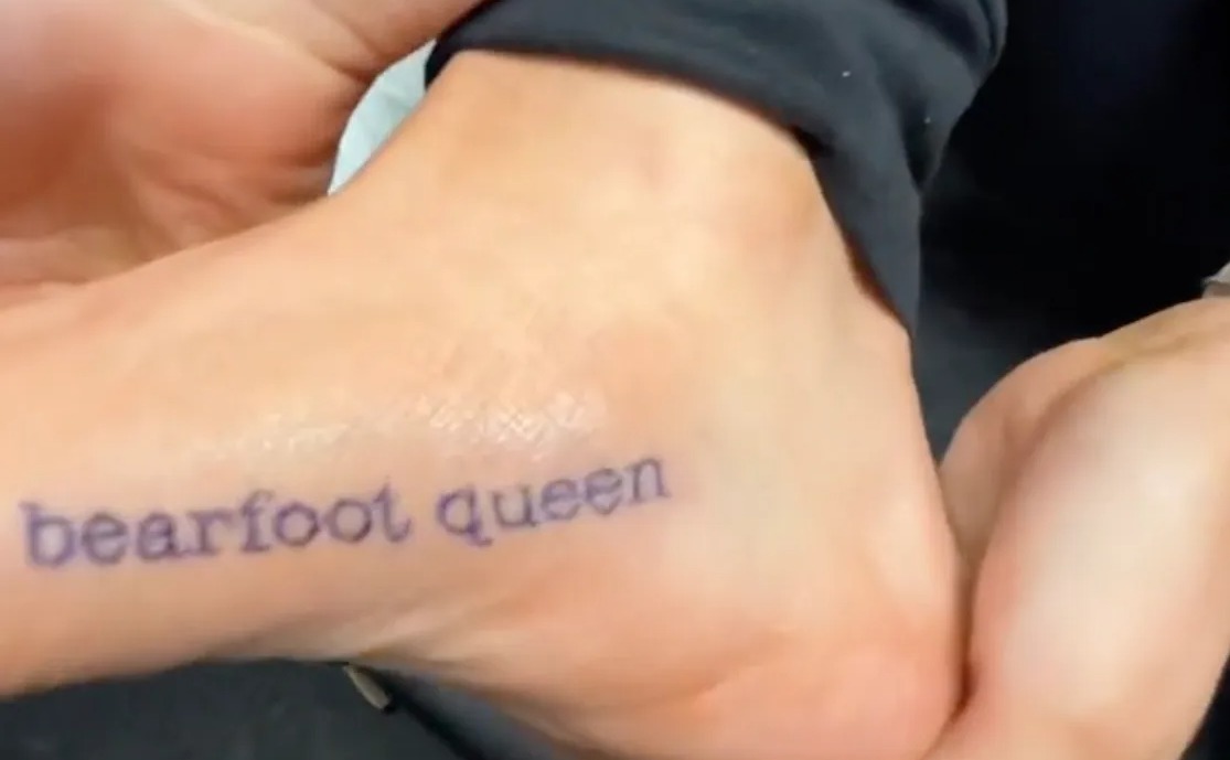 The TikToker spelled her tattoo 'bearfoot' instead of 'barefoot'