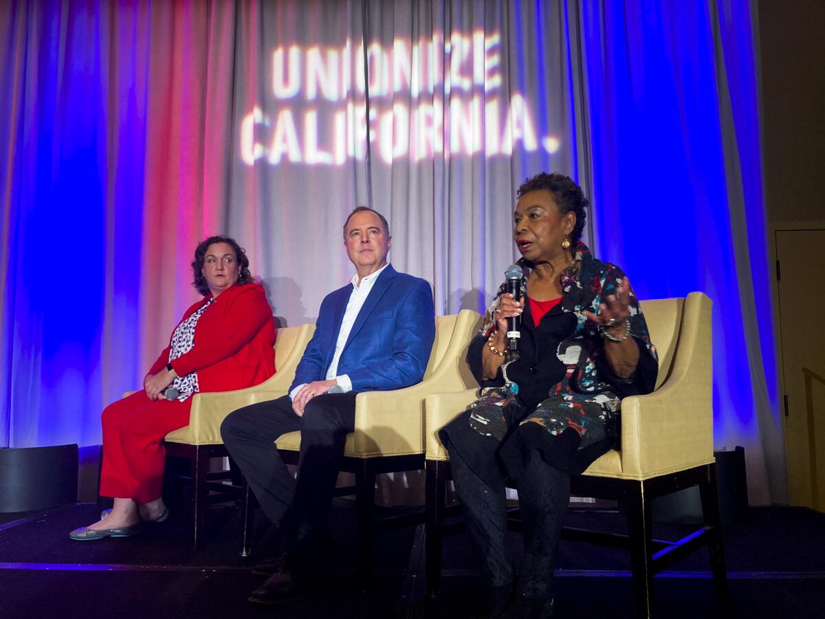 From left, Rep. Katie Porter, Rep. Adam Schiff and Rep. Barbara Lee participate in a forum.