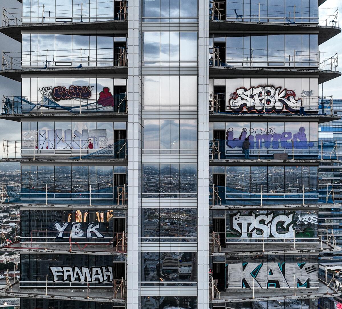 Taggers have graffitied what appears to be more than 25 stories of a downtown Los Angeles 