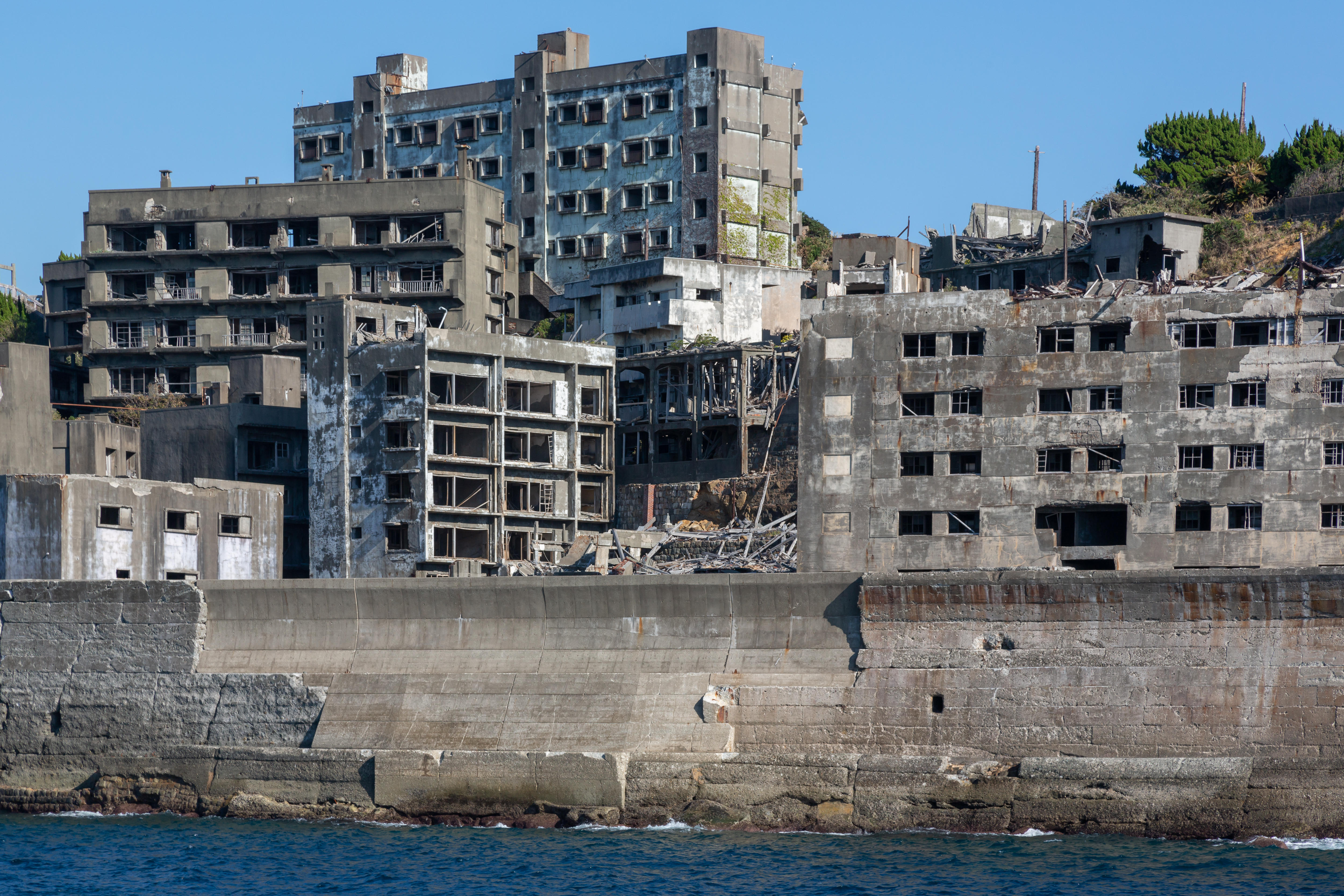 Concrete buildings on the island are now decrepit