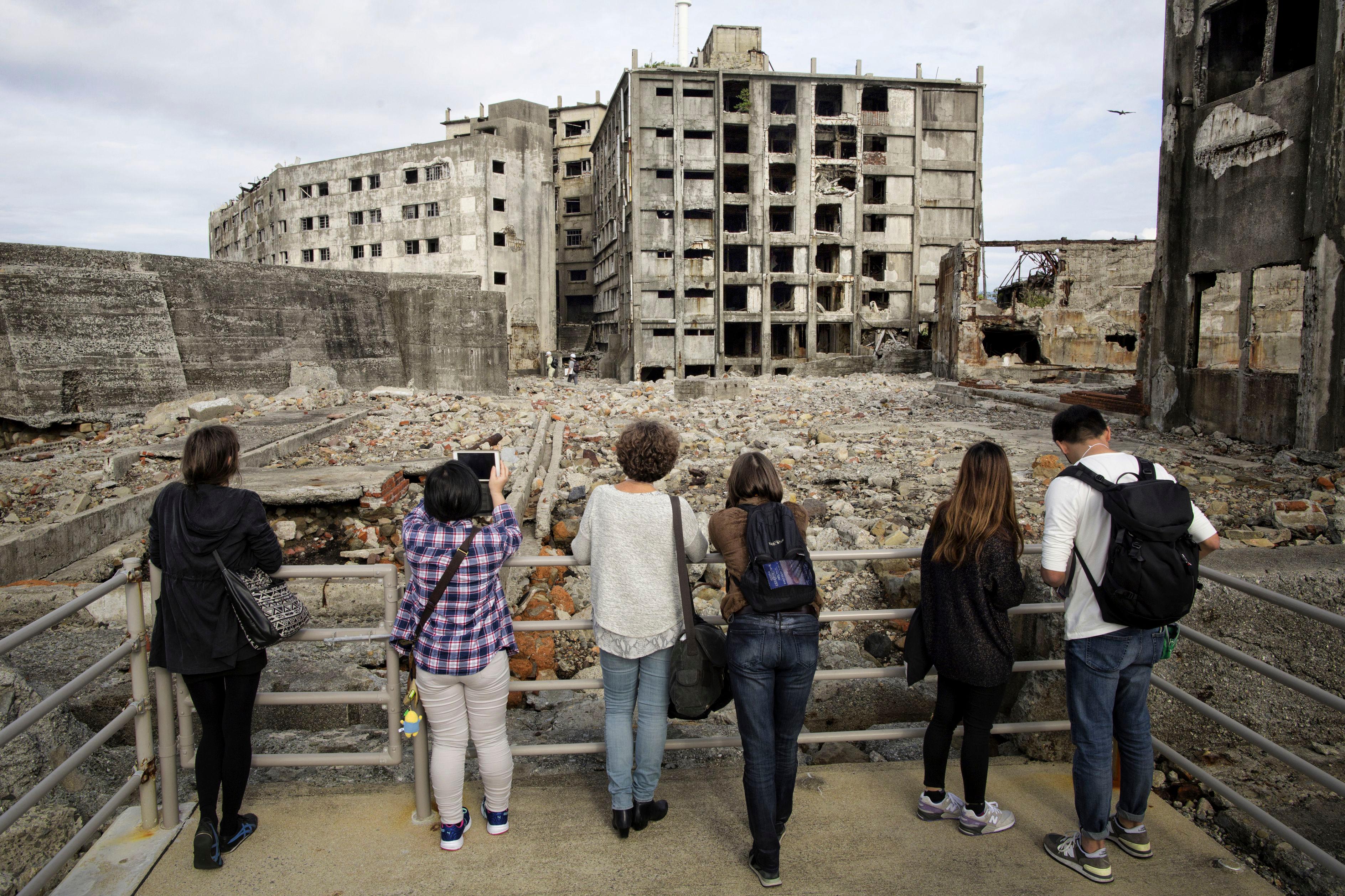 Tourists visit the eerie island of ghosts