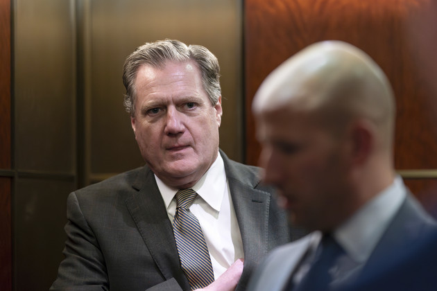 Mike Turner, R-Ohio, steps into an elevator after leaving a secure facility in the basement of the Capitol in Washington.