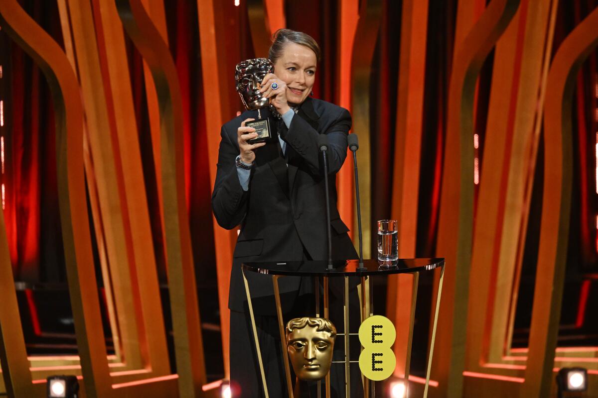 An actor accepts a public-service honor, the highest given at the BAFTAs.