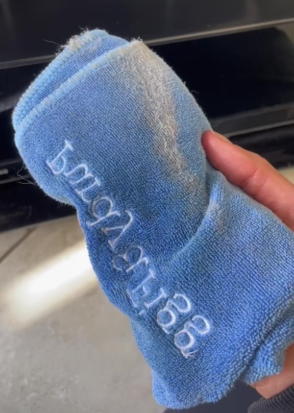 According to this cleaner, you'll need to use a dry cloth to remove dust