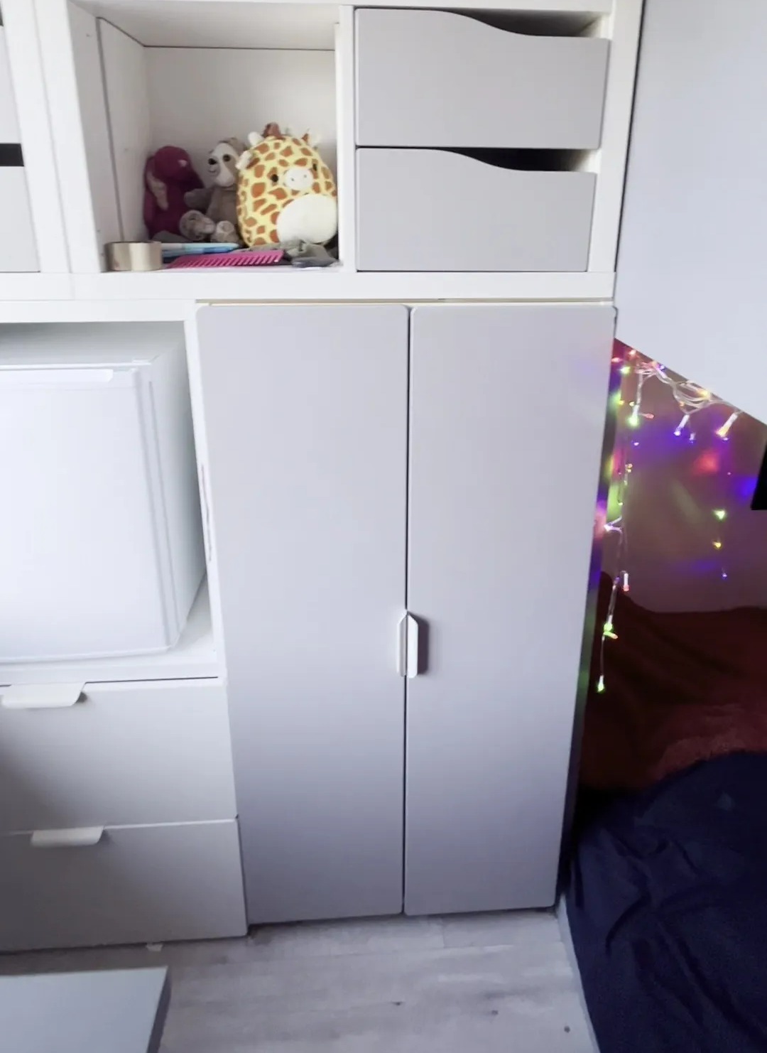 Her bedroom is complete with a fully-stocked fridge