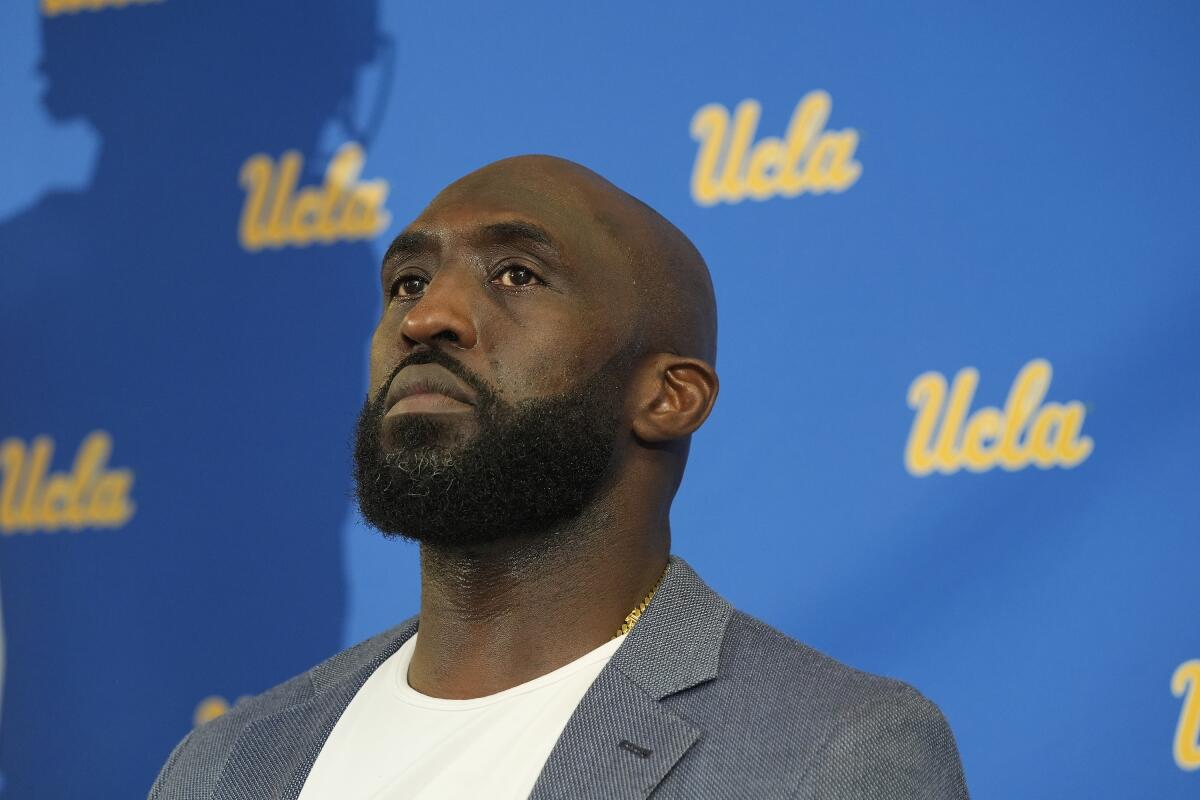 Former UCLA great DeShaun Foster is introduced as the school's new football coach.