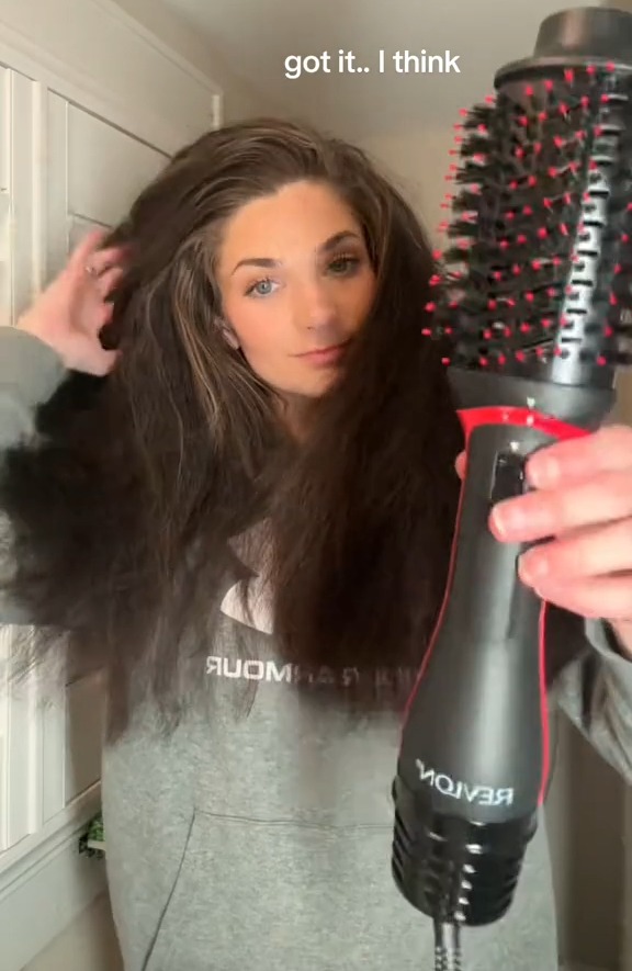 She used the Revlon hair brush to tame her locks