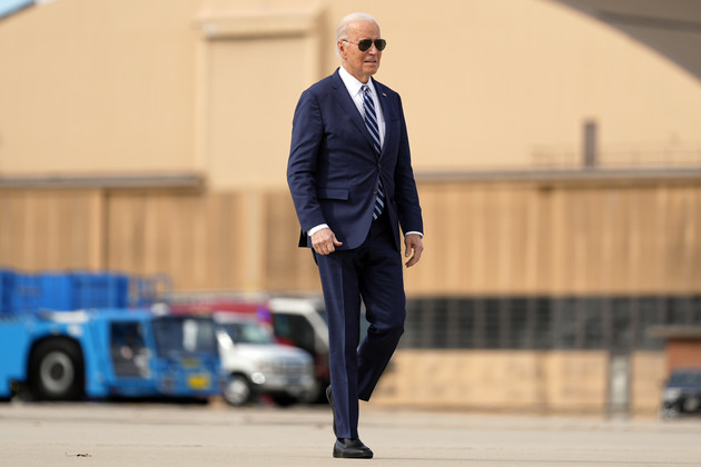 President Joe Biden walks to board Air Force One at Andrews Air Force Base, Md.