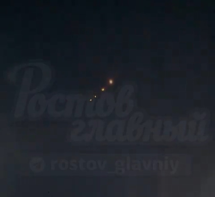 The aircraft is seen emitting light before bursting into a fireball