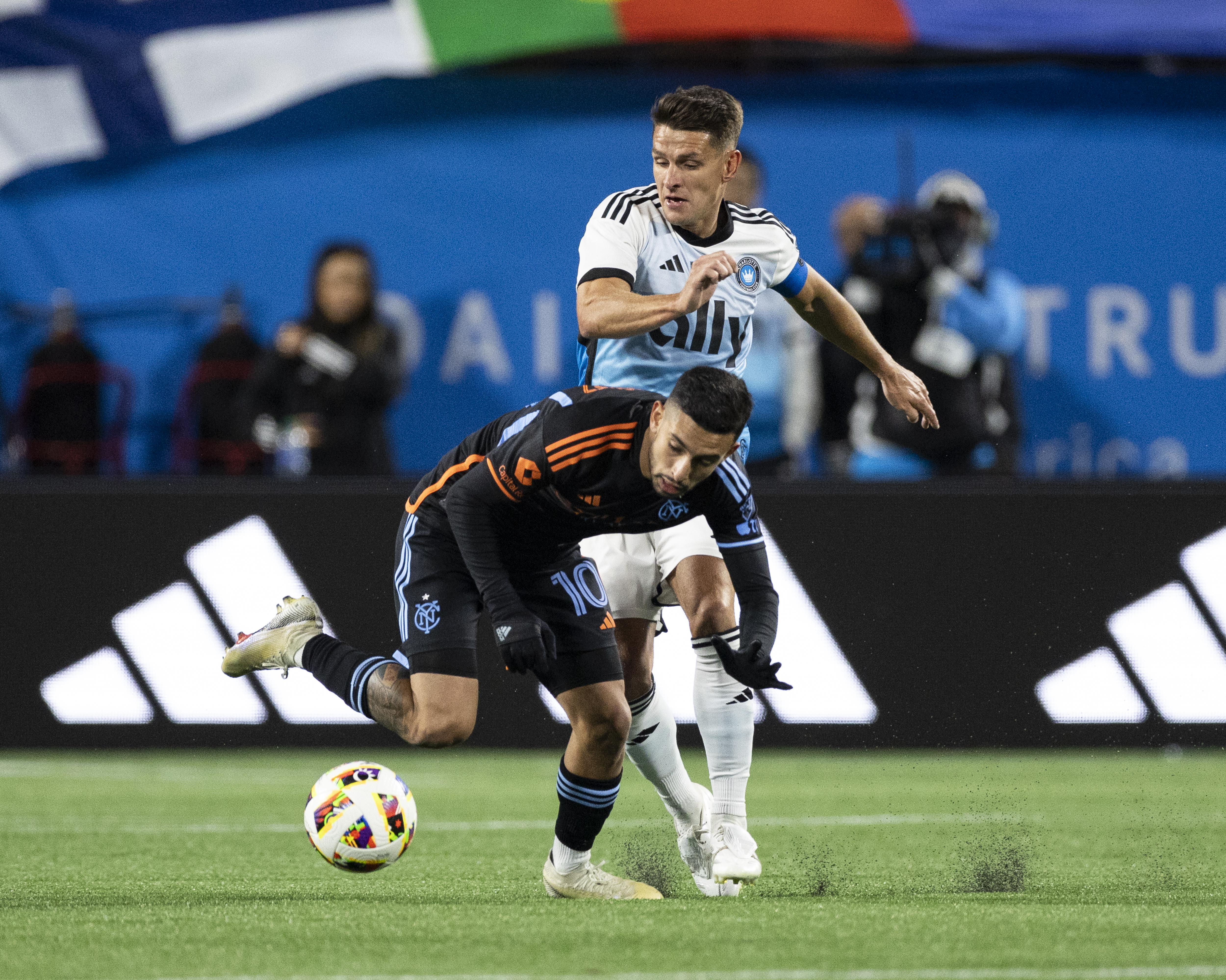 Westwood, seen tussling with New York City's Santiago Rodríguez, claims the MLS is no easy ride and has a 'sprinkle of Prem magic'