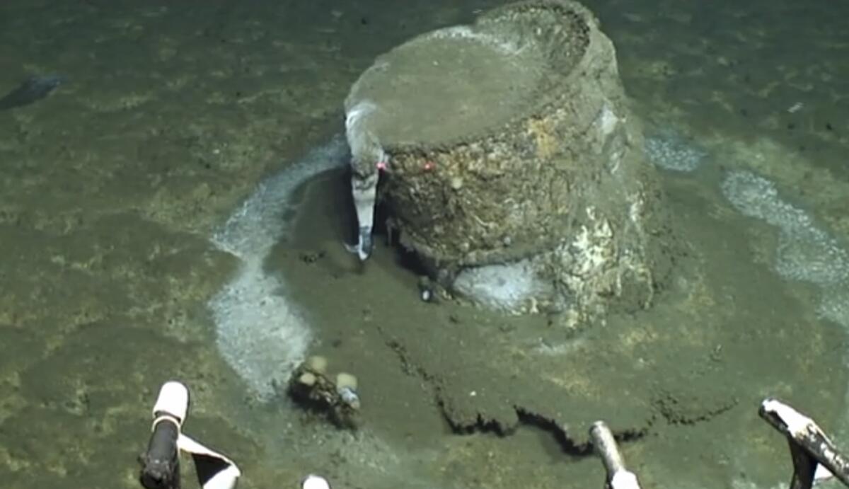 A barrel sits 3,000 feet underwater.