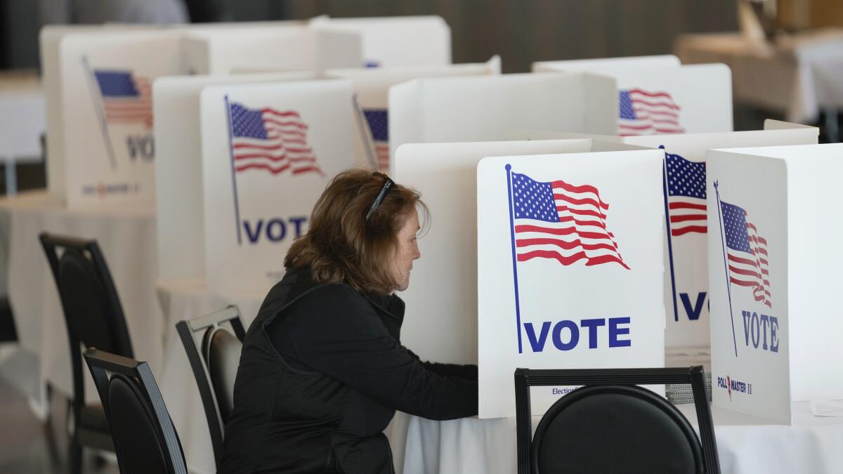 A voter at a polling place in Grosse Pointe Farms, Mich.